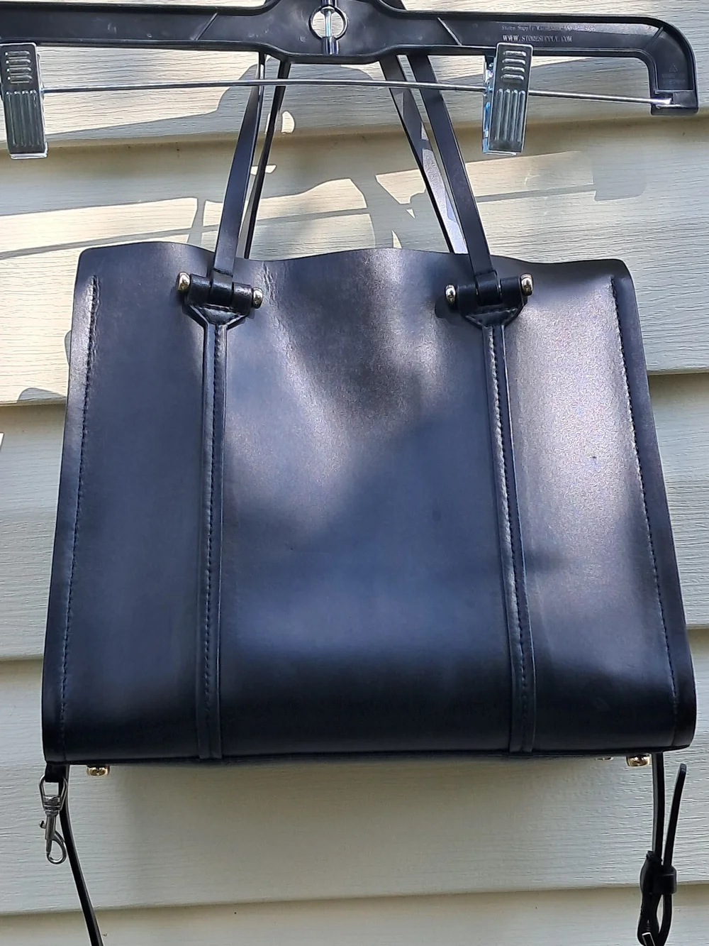 Kate Spade New York black leather tote bag with shoulder strap​